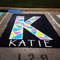 colorful letter K in a parking spot